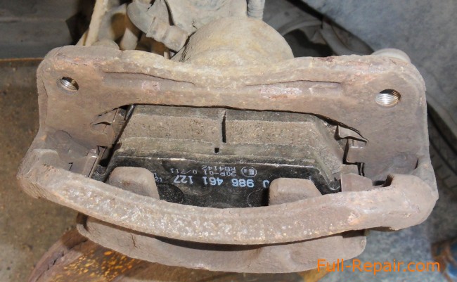 In the caliper installed new brake pads In the caliper installed new brake pads