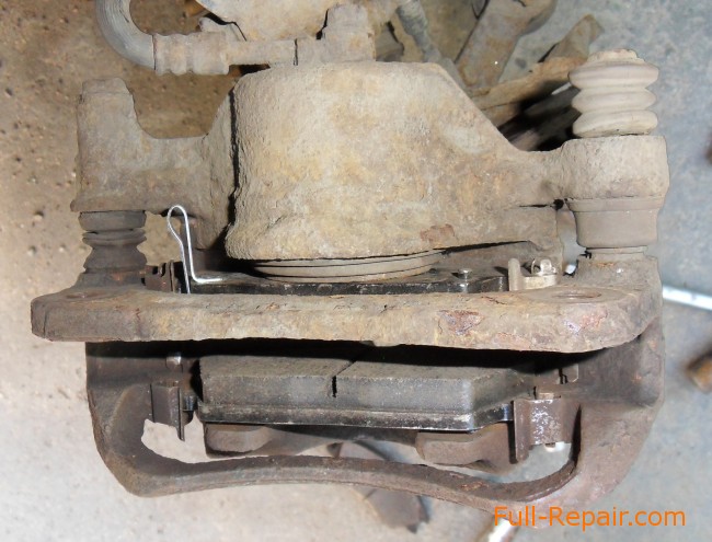 In the caliper installed new brake pads In the caliper installed new brake pads