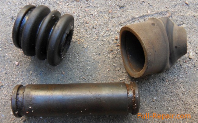 Rusty guide bush and dust caps Rusty guide bush and dust caps