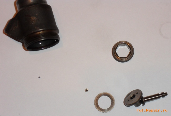 Disassembled return valve