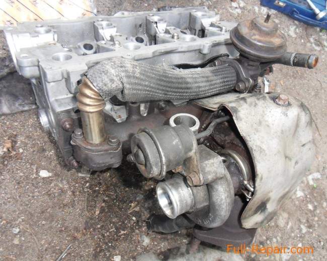The EGR valve on the cylinder head removed