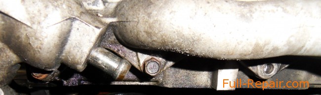 The lower left portion of the intake manifold The lower left portion of the intake manifold