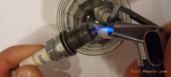 Cleaning the spark in the acid with heating