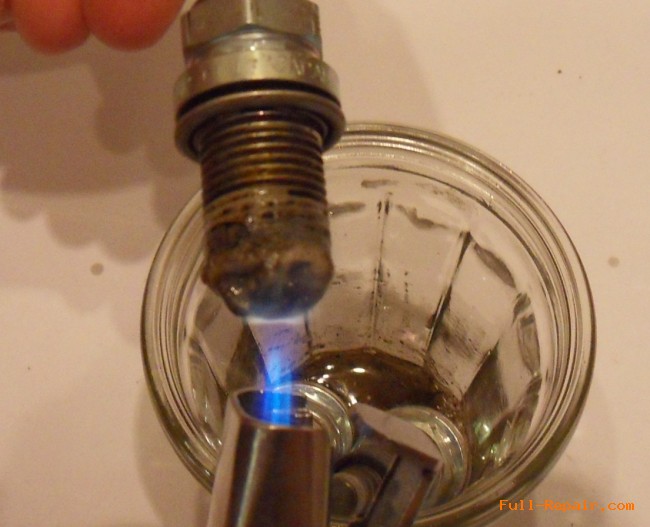 Cleaning the spark in the acid with heating