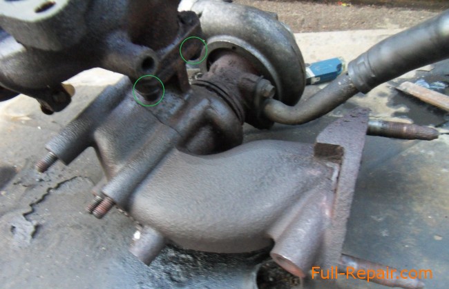 The three nuts holding the turbine to the exhaust manifold