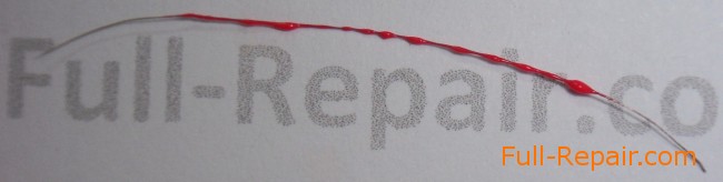 A thin copper wire coated with lacquer A thin copper wire coated with lacquer
